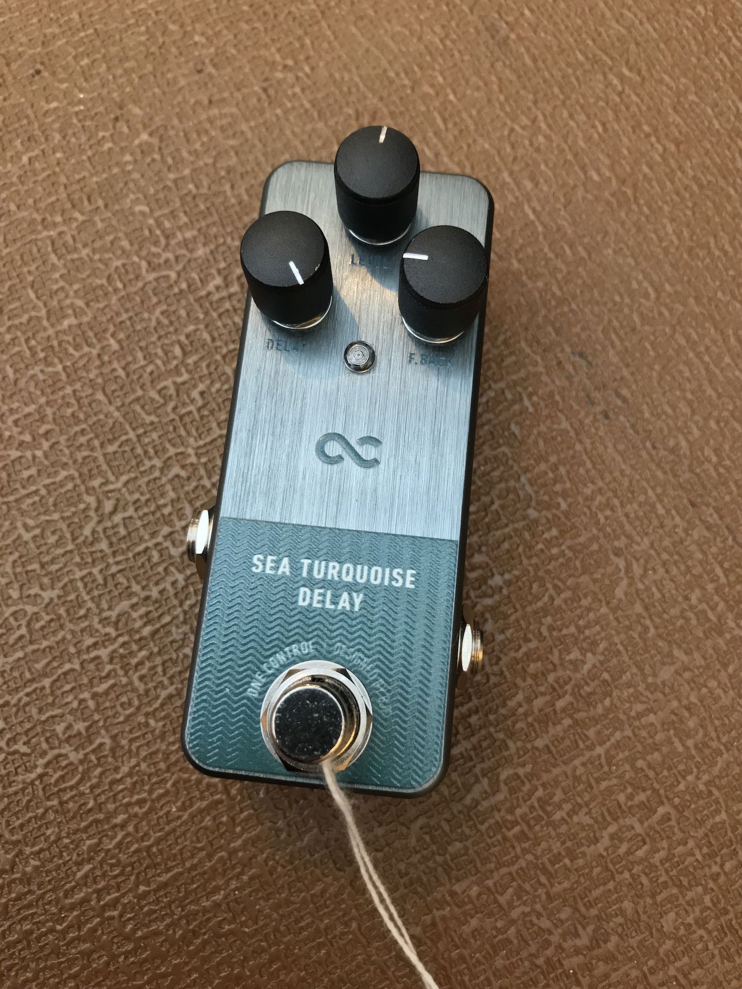 USED One Control Sea Turquoise Delay