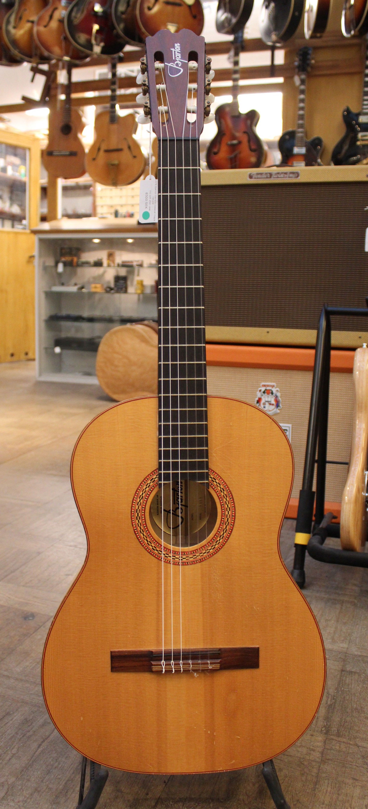 Estrella deals classical guitar